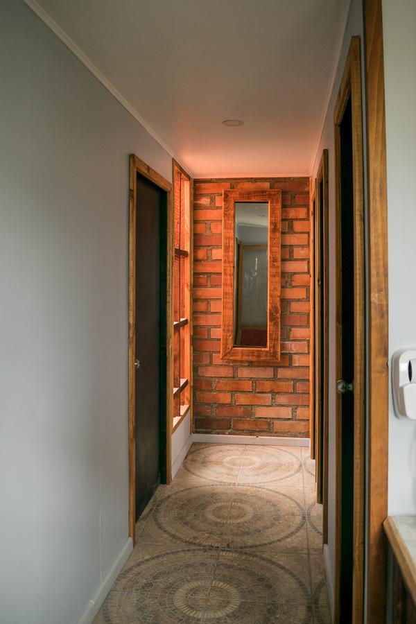 Хостел Puma House Пуэрто-Наталес Экстерьер фото