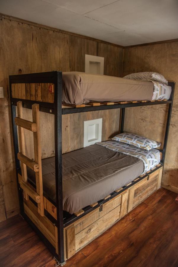 Хостел Puma House Пуэрто-Наталес Экстерьер фото