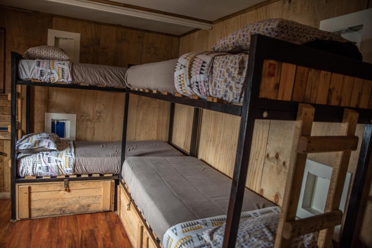 Хостел Puma House Пуэрто-Наталес Экстерьер фото